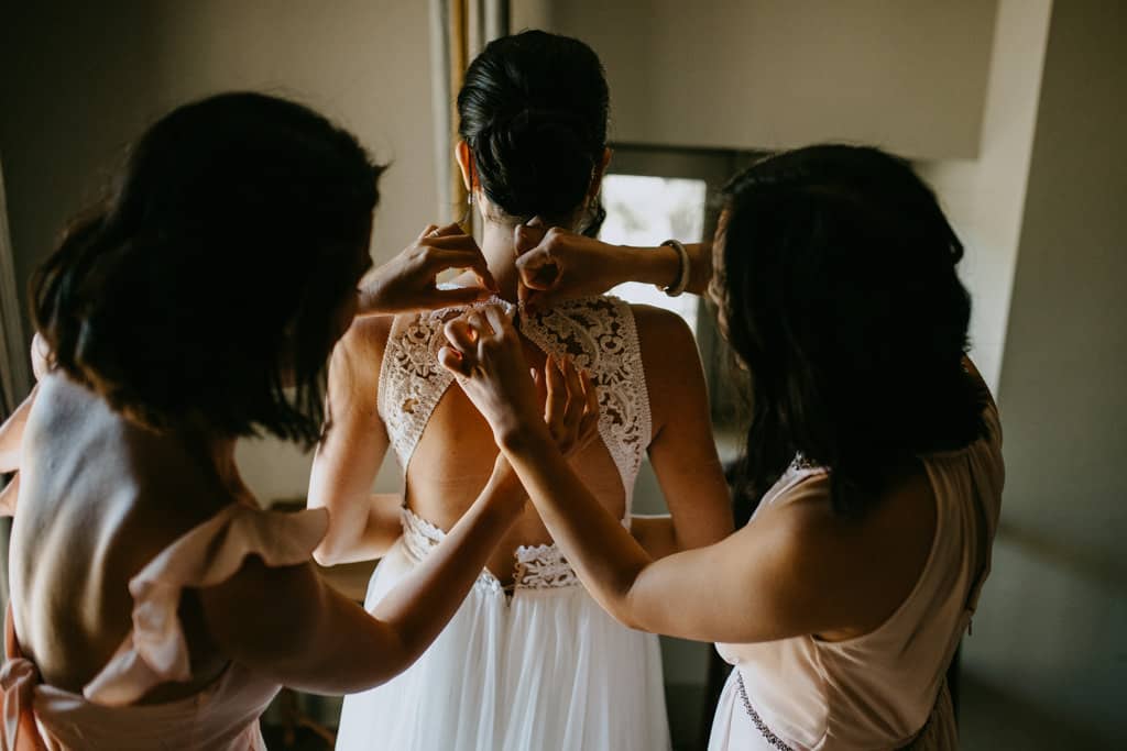 fermeture robe de mariée photographe